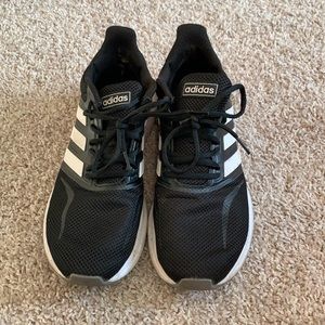 Black Adidas running shoes